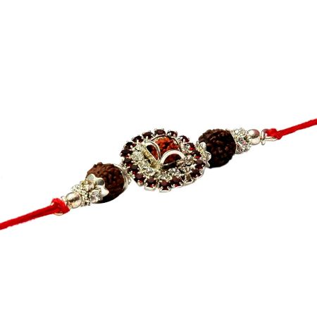 Auspicious Rudraksha with Silvr Cap Rakhi with Red-White Diamonds